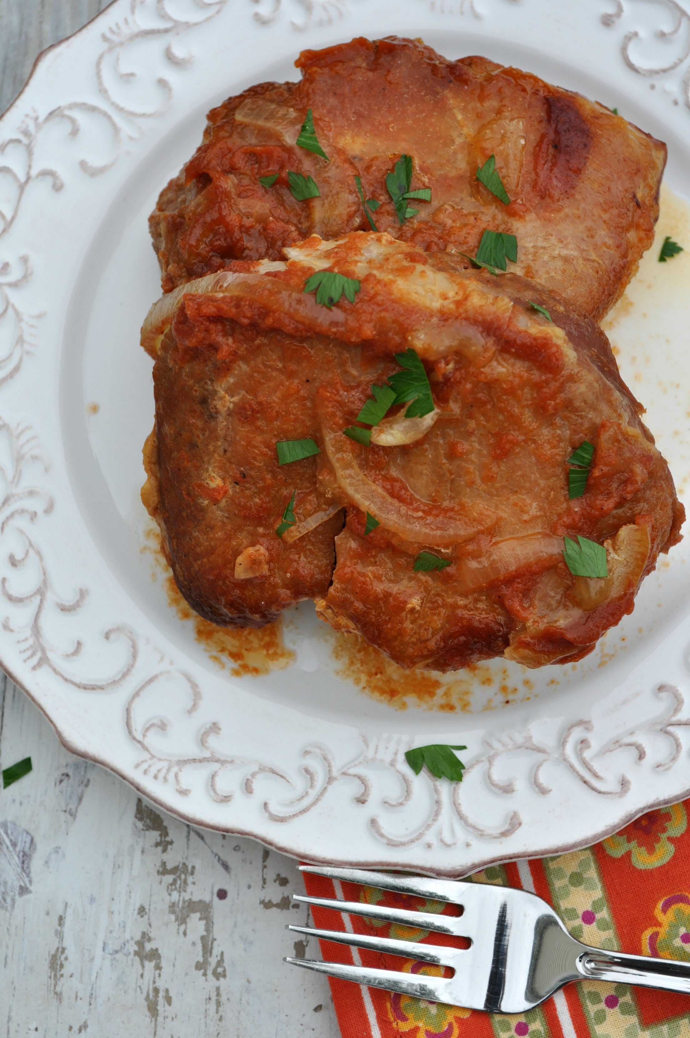 Slow Cooker Saucy Pork Chops - The Seasoned Mom
