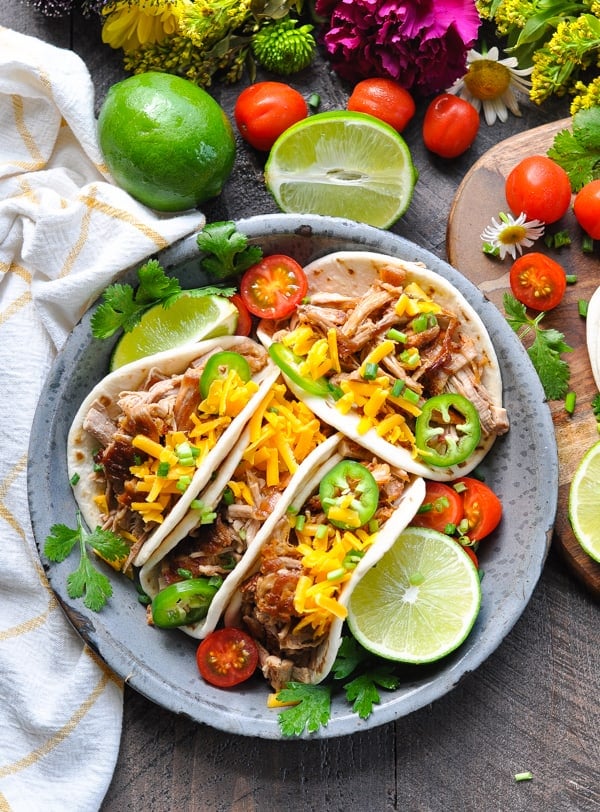 Overhead shot of a plate of easy and crispy slow cooker carnitas