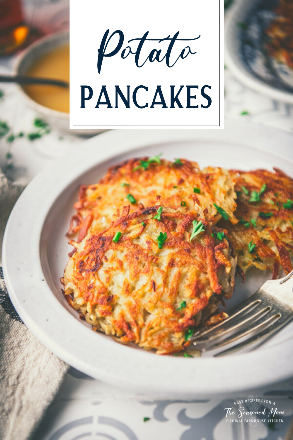 Side shot of a plate of potato pancakes with text title overlay