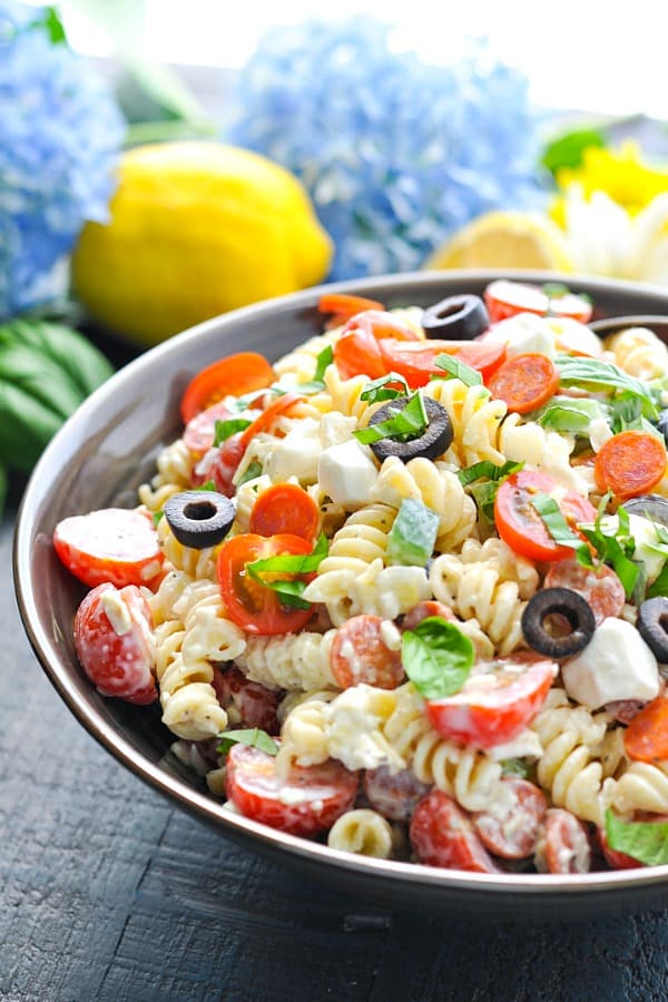 Front shot of a big bowl of an easy Creamy Pasta Salad recipe with Italian dressing