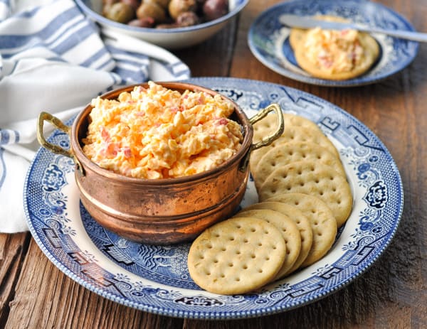 Horizontal shot of pimento cheese spread in a copper bowl