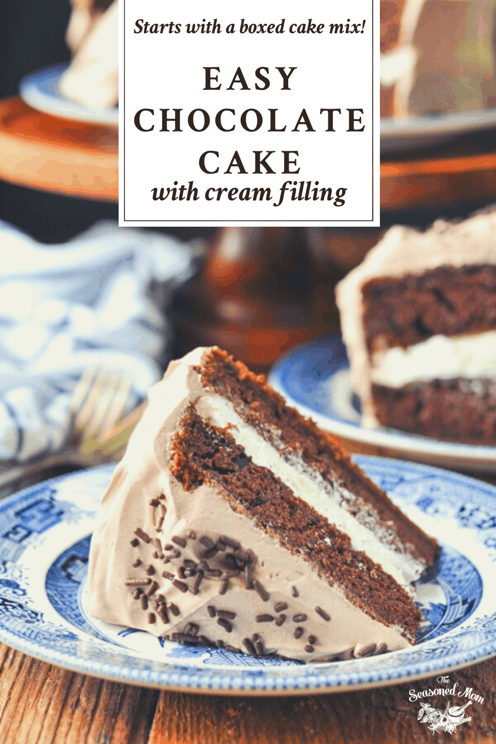 Easy chocolate cake with cream filling on a blue and white plate with a text title at the top