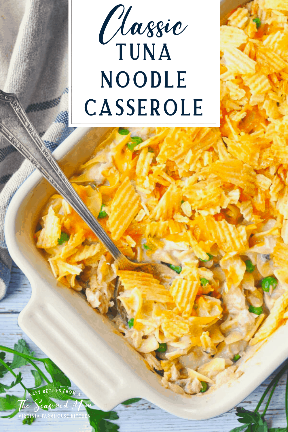 Overhead shot of Creamy Tuna Noodle Casserole in a dish with a text title box at the top