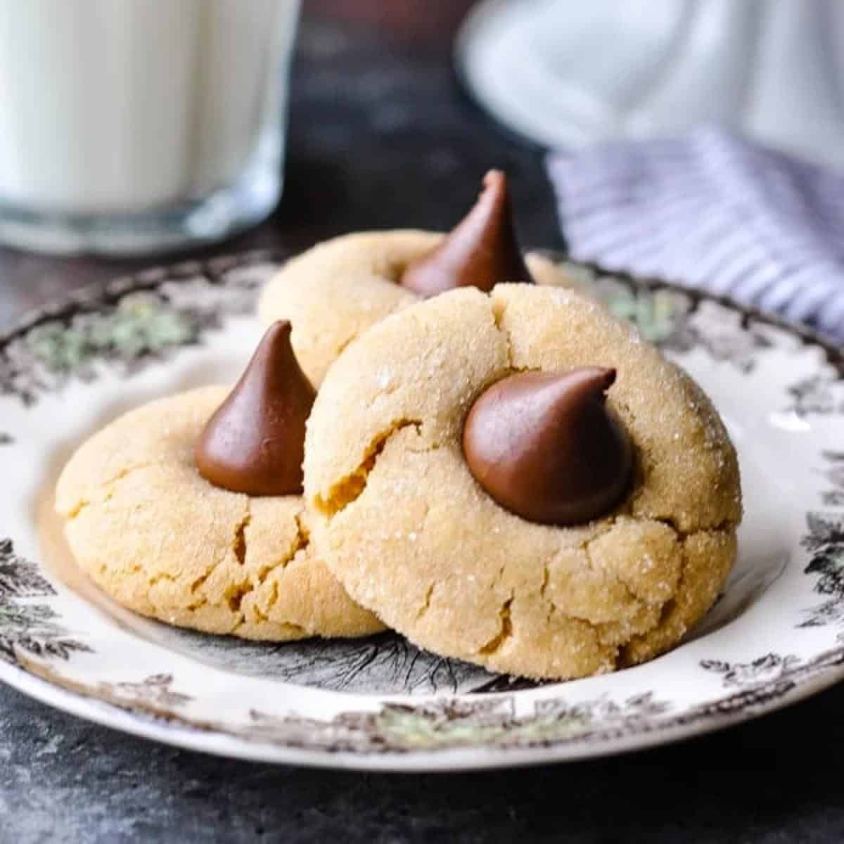 https://www.theseasonedmom.com/wp-content/uploads/2020/10/Soft-Peanut-Butter-Blossoms-Square.jpg