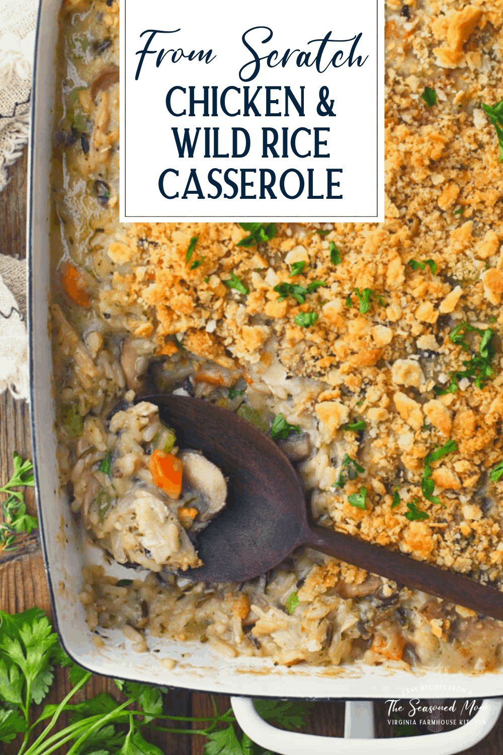 Overhead shot of a chicken wild rice and vegetable casserole with text title overlay