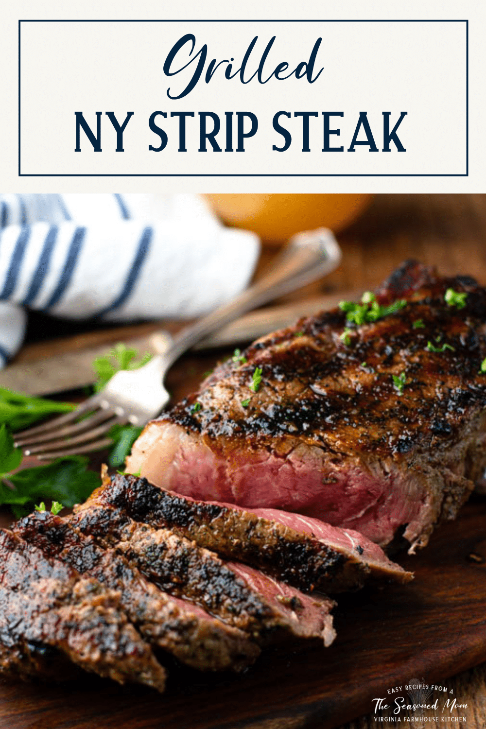 Grilled strip steak on a cutting board with text title box at top