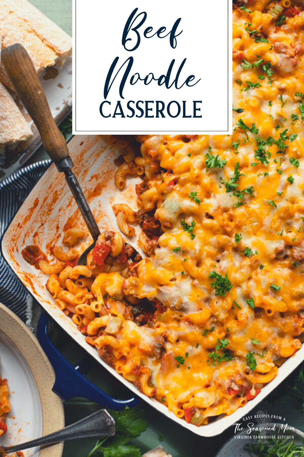 Overhead shot of cheesy ground beef noodle casserole with text title overlay