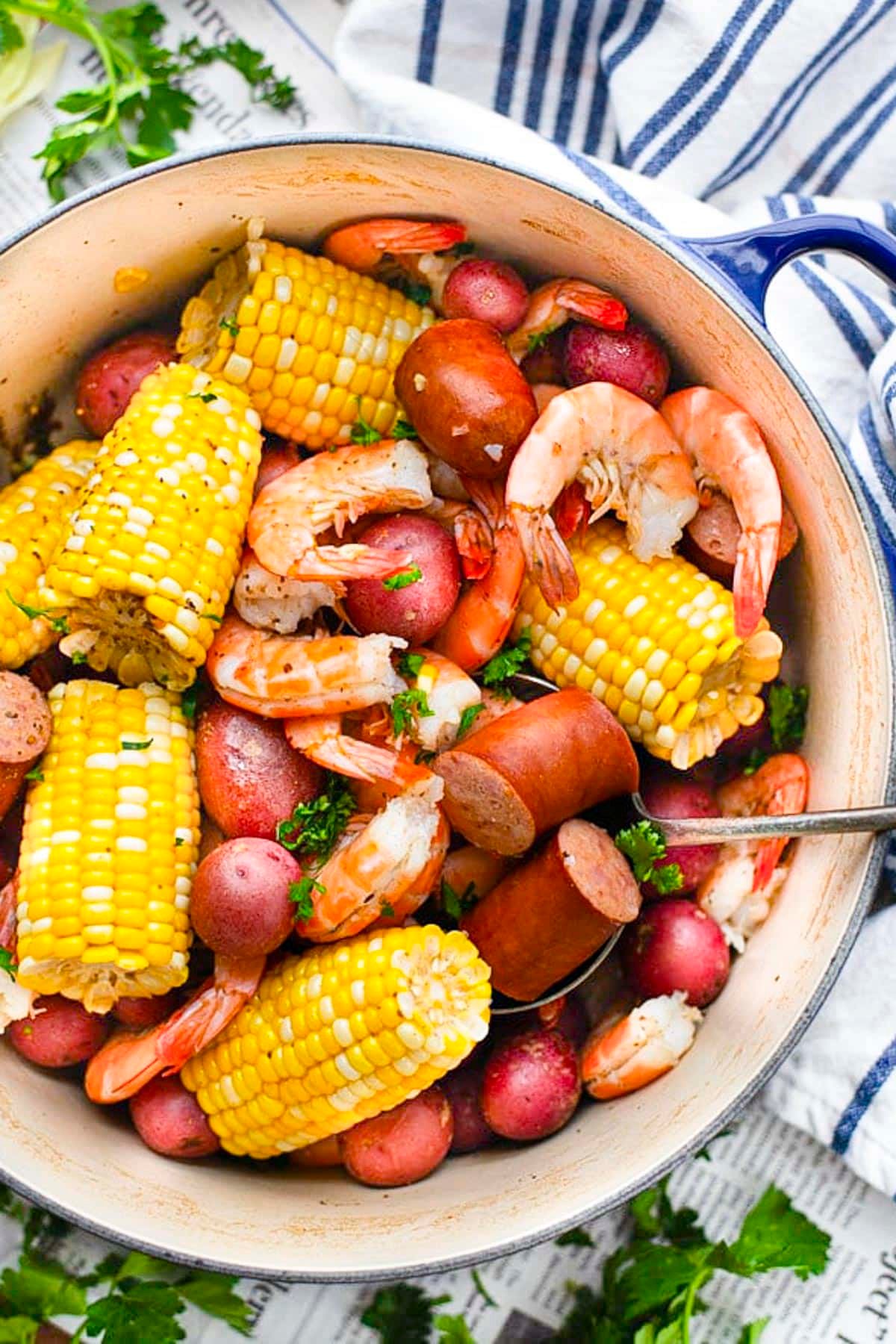 Close overhead image of a Dutch oven full of frogmore stew.