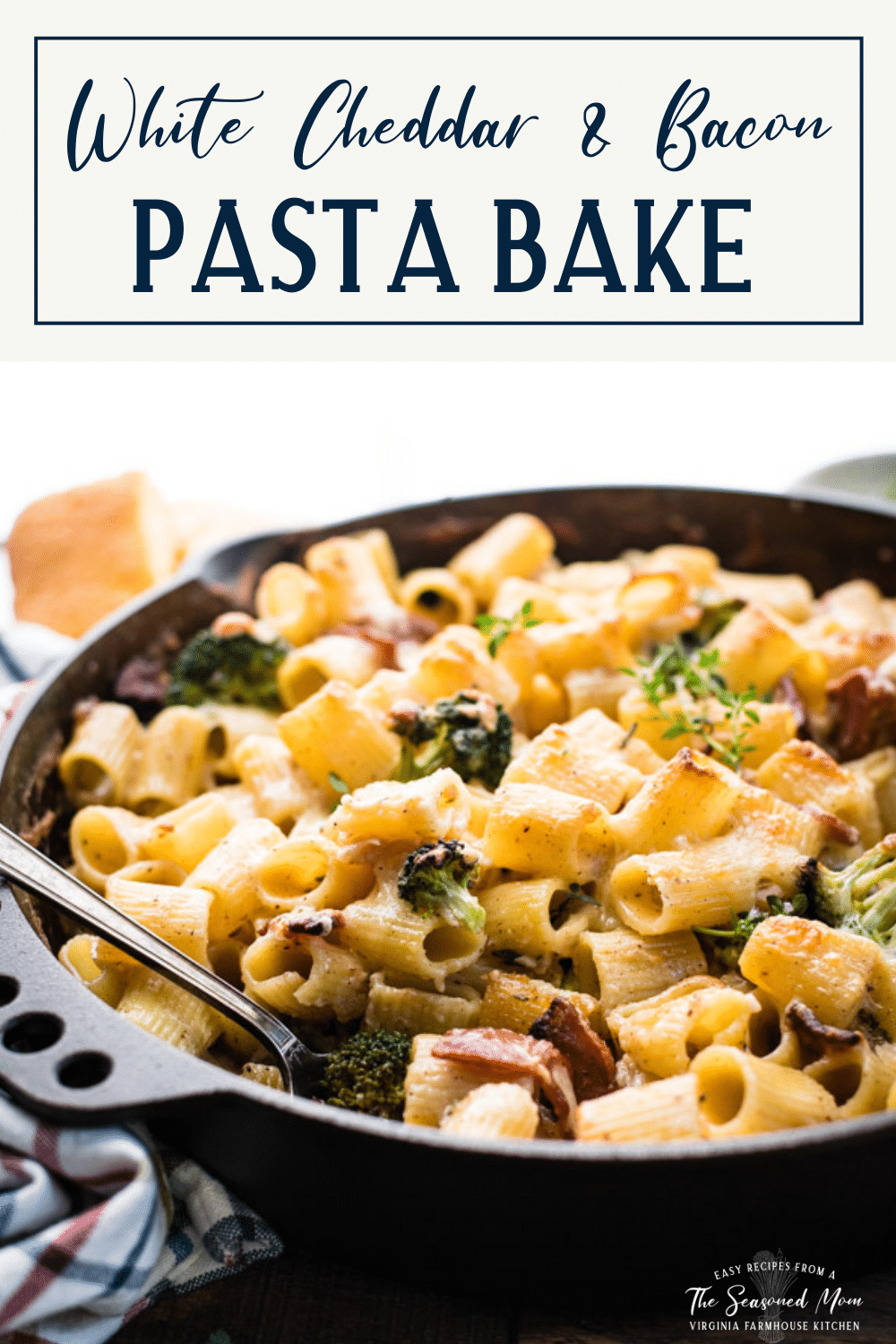 Close up side shot of a rigatoni pasta bake with text title box at top