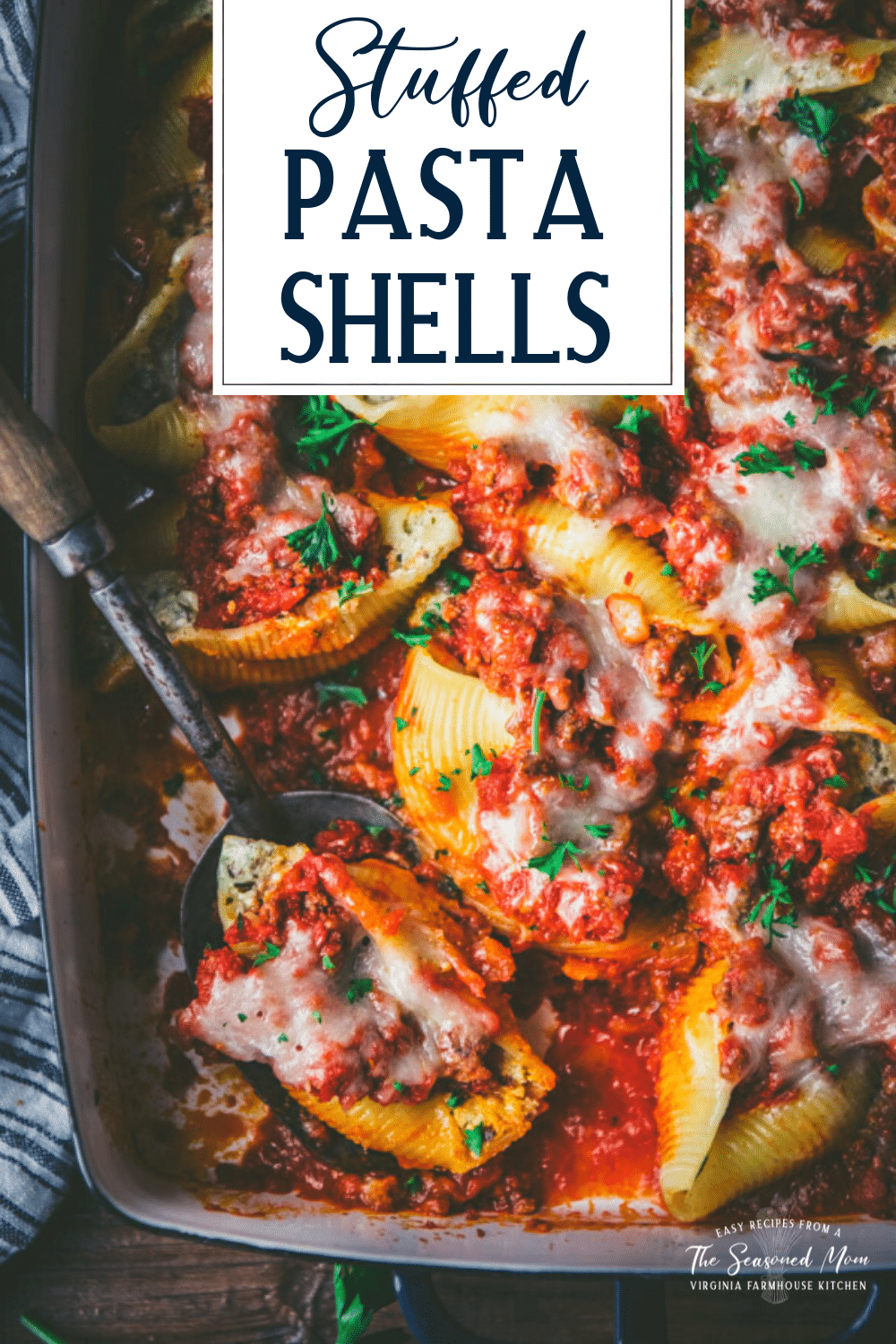 Close overhead shot of stuffed pasta shells with text title overlay