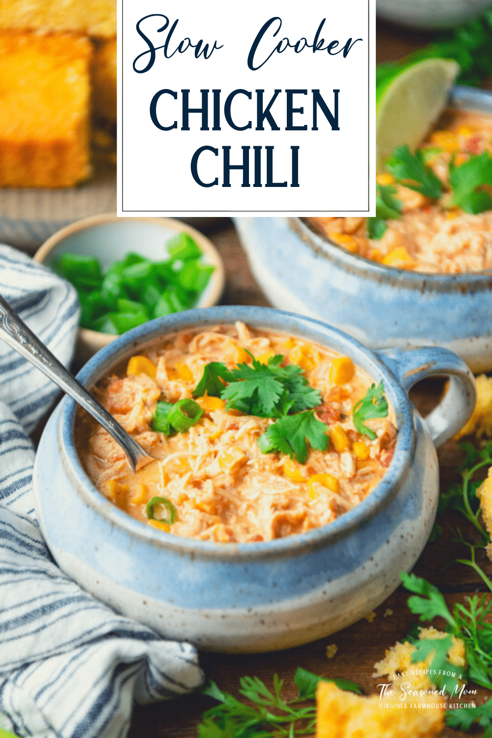 Side shot of a bowl of slow cooker white chicken chili with text title overlay