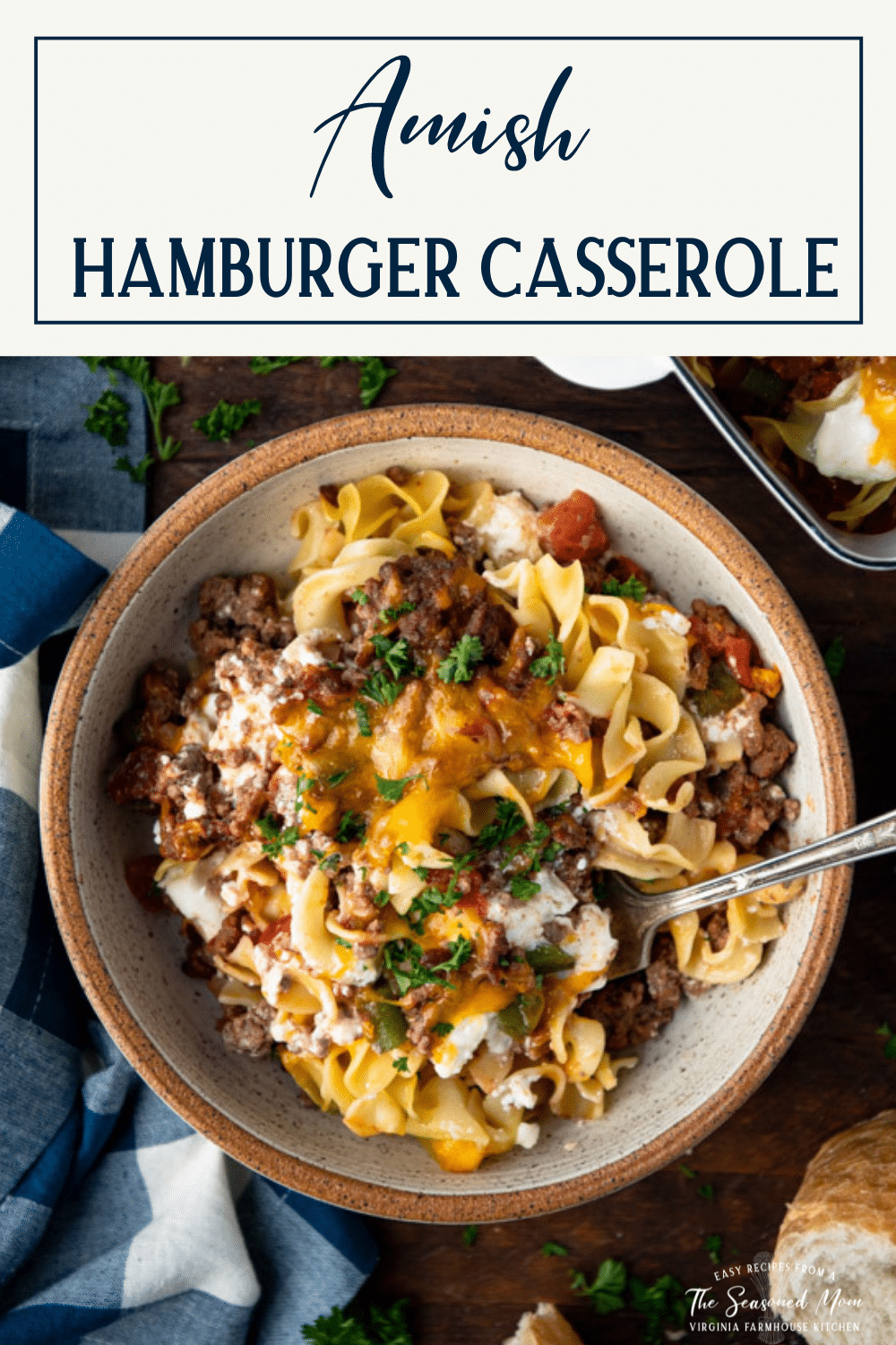 Close overhead image of a bowl of hamburger casserole with text title box at top.