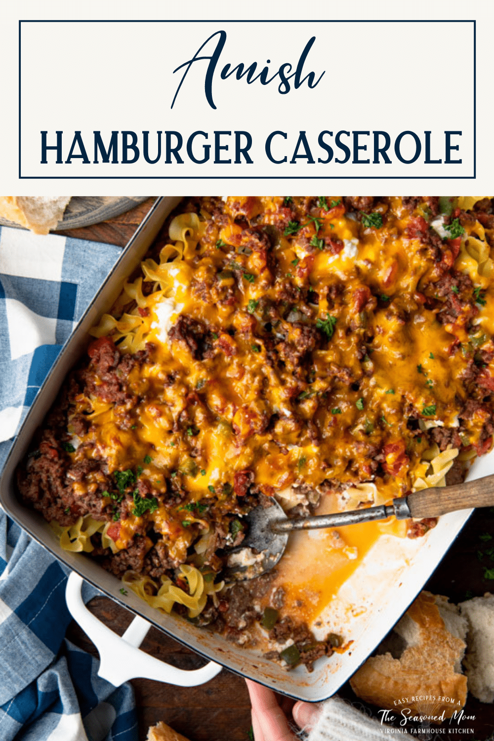 Overhead shot of a pan of hamburger noodle casserole with text title box at top.