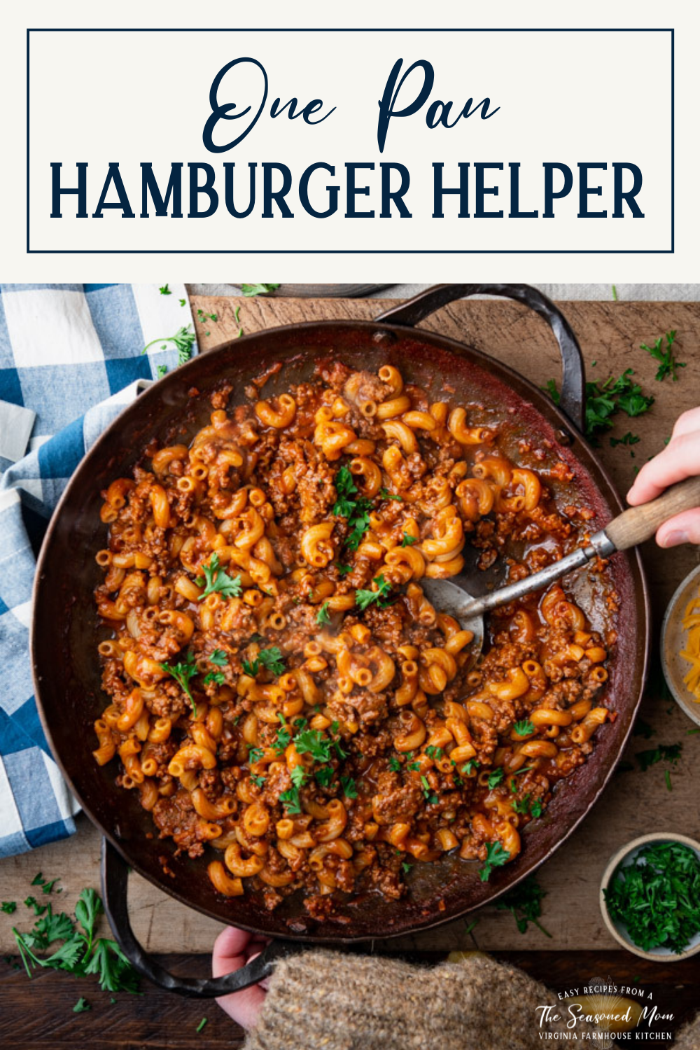 Overhead shot of a skillet of homemade hamburger helper with text title box at top.