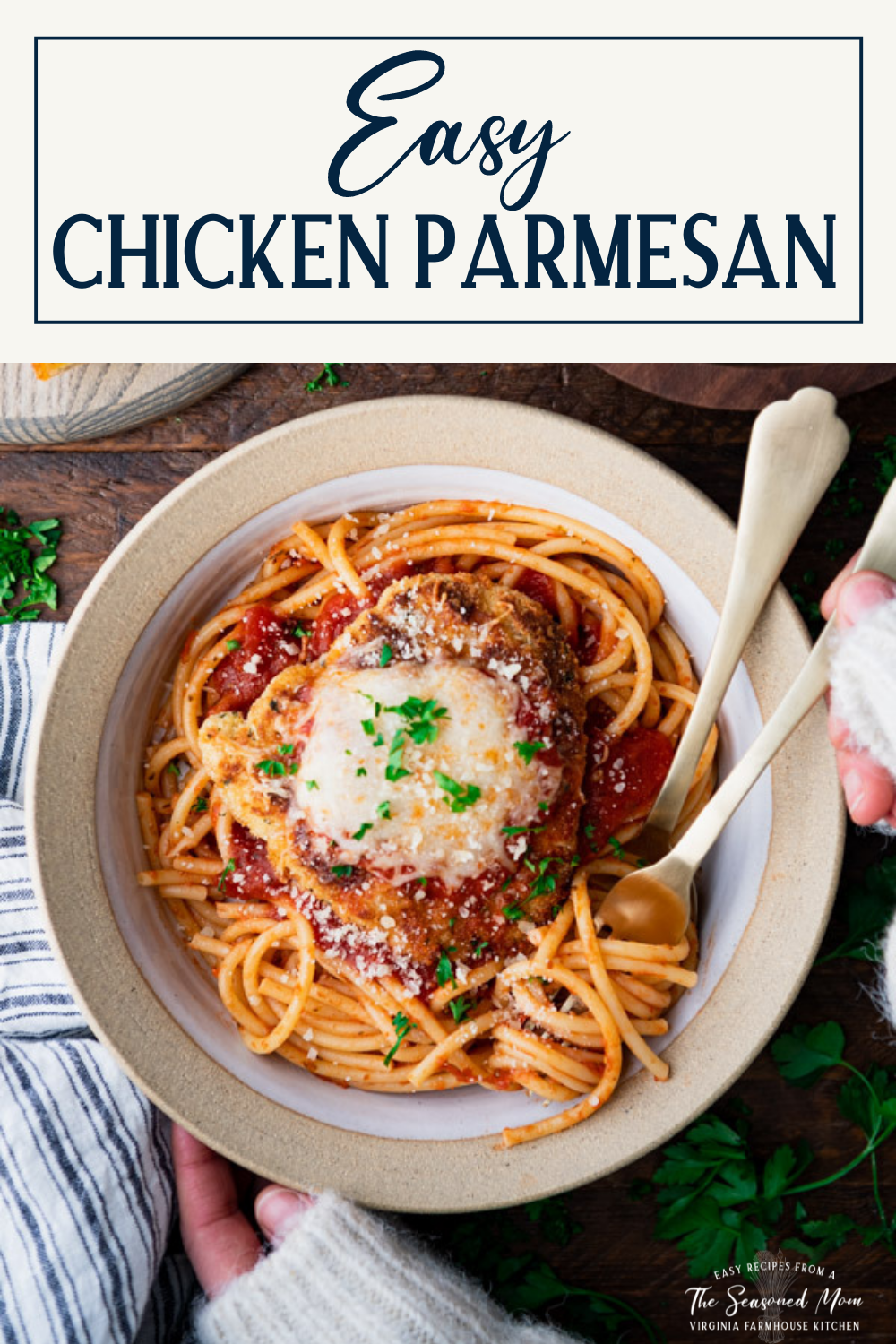 Hands eating a bowl of chicken parmesan with pasta and text title box at top