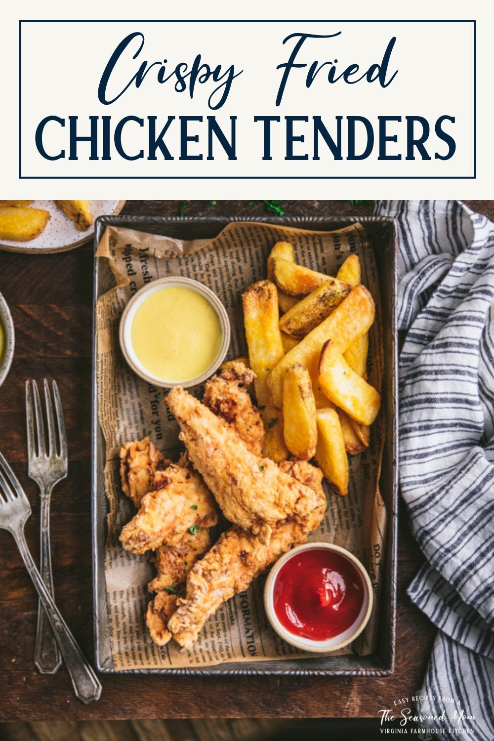 Tray of crispy fried chicken tenders with text title box at top