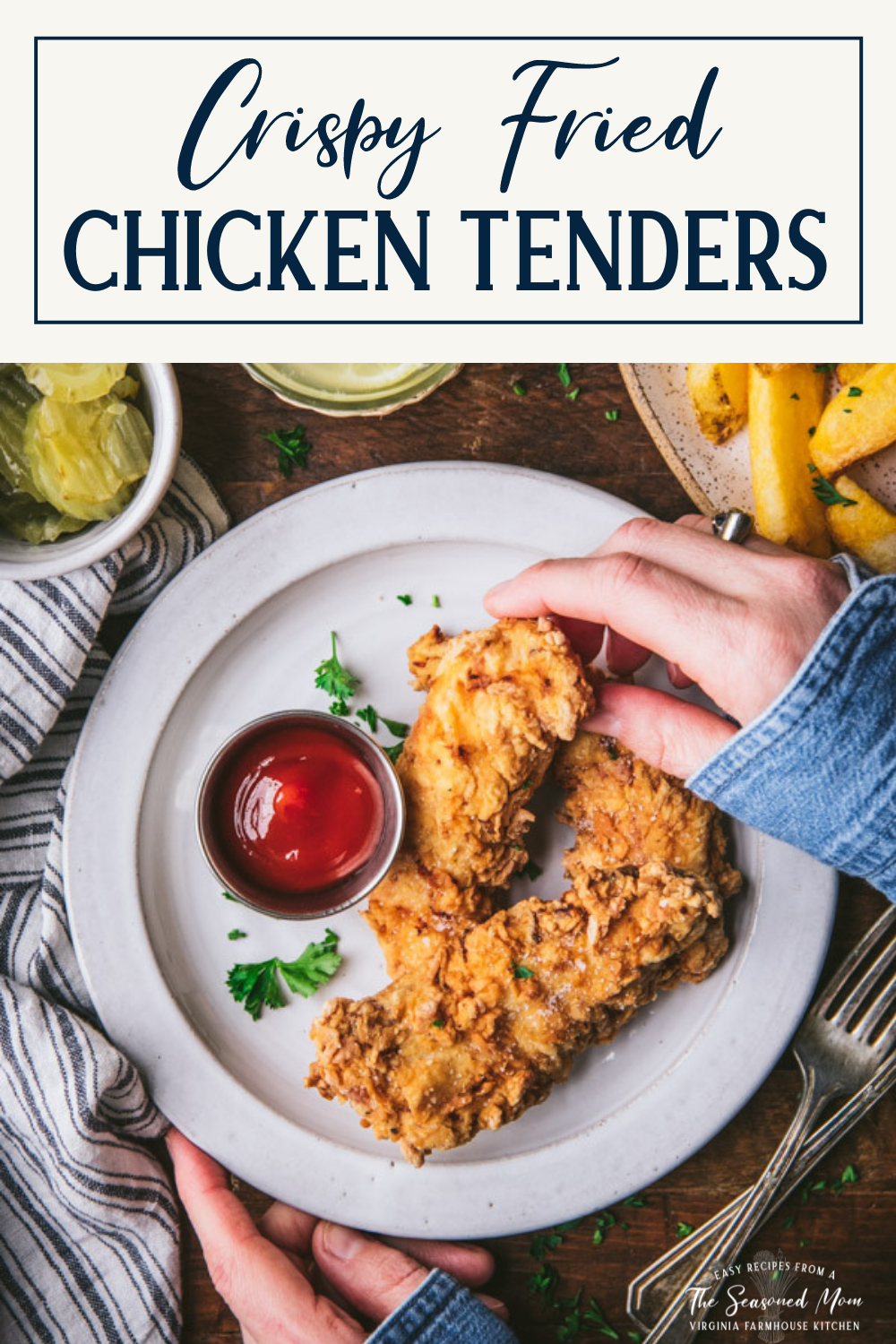 Hand eating fried chicken tenders with text title box at top