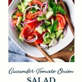 Cucumber tomato onion salad with text title at the bottom.