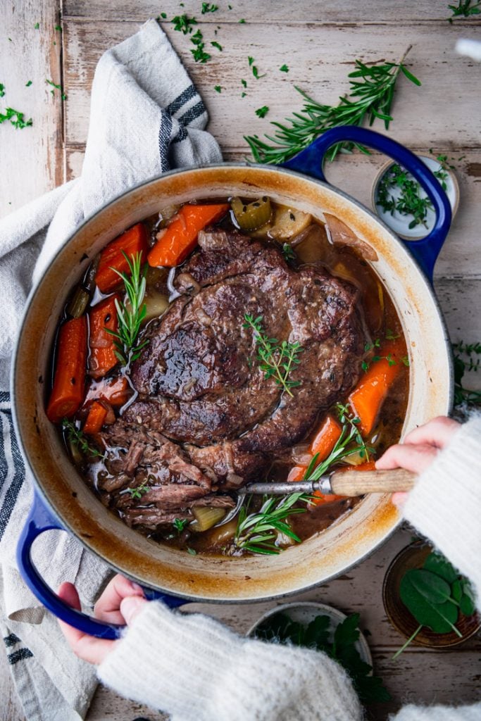 Dutch Oven Pot Roast with Carrots and Potatoes - Feast and Farm