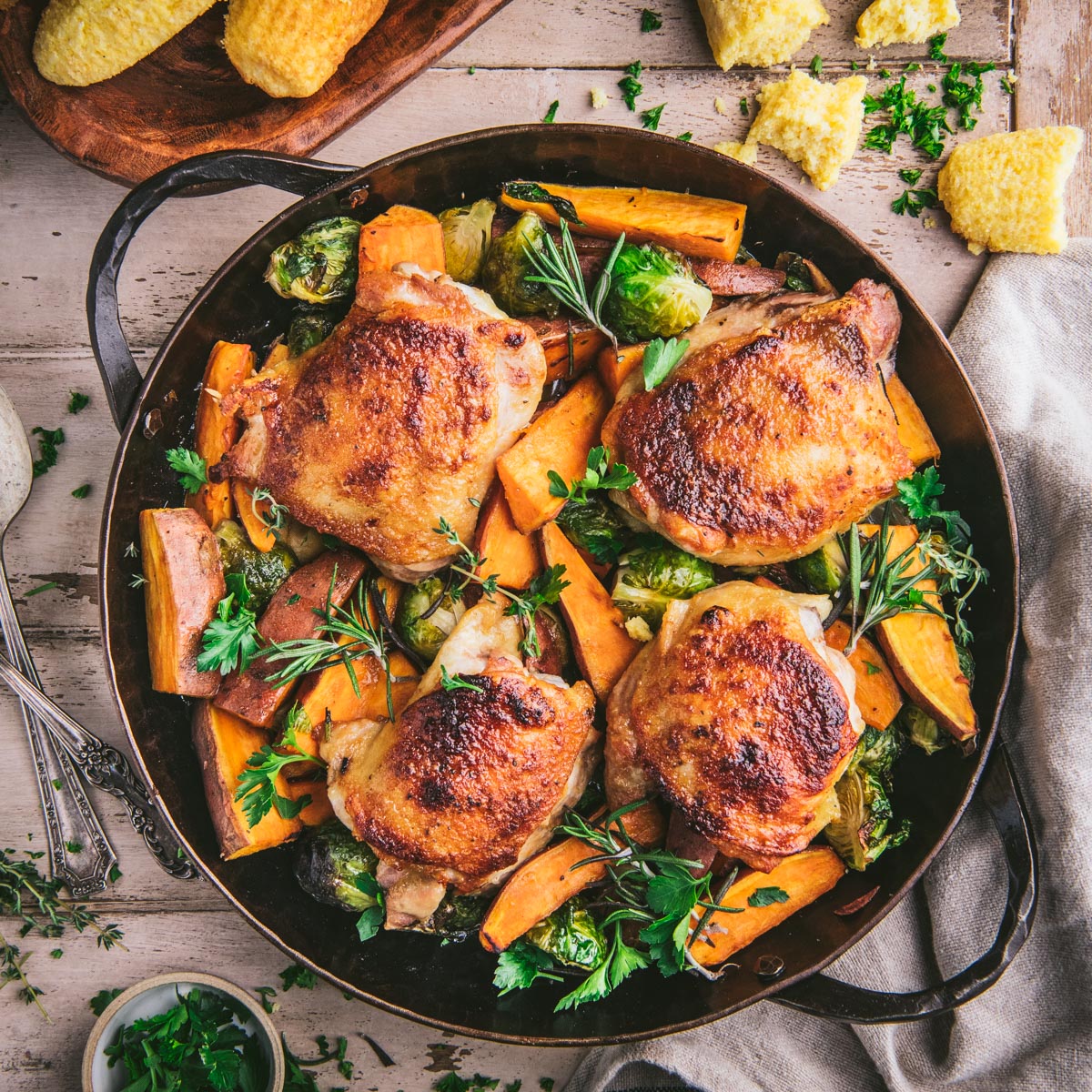 https://www.theseasonedmom.com/wp-content/uploads/2022/12/Maple-Roasted-Chicken-Thighs-with-Vegetables-5.jpg