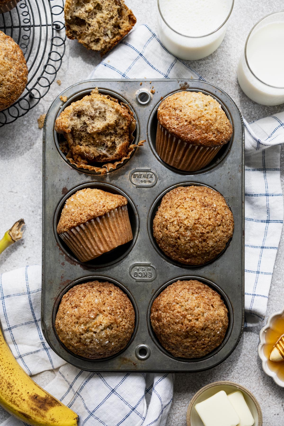 Overhead image of the best banana nut muffins in a vintage muffin tin.