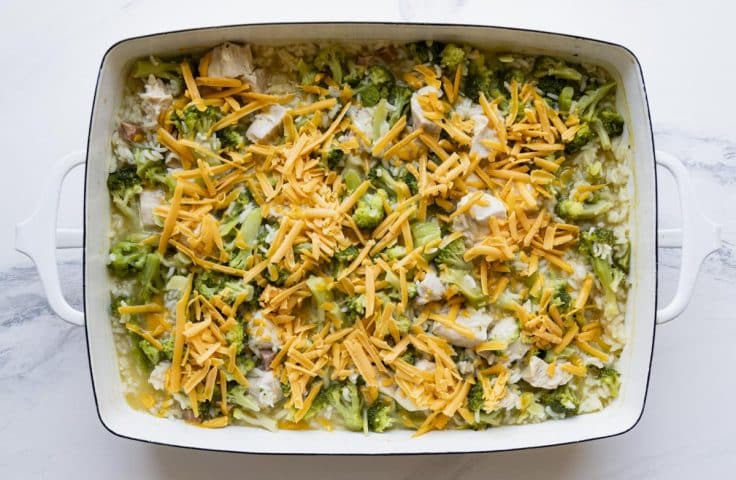 Process shot showing how to make easy chicken broccoli rice casserole in oven.
