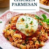 Healthy chicken parmesan with text title overlay.