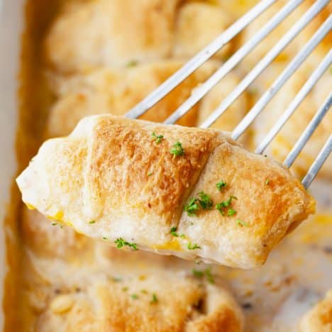 Square side shot of chicken crescent rolls on a serving spatula.