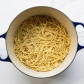 Cooked spaghetti in a Dutch oven.