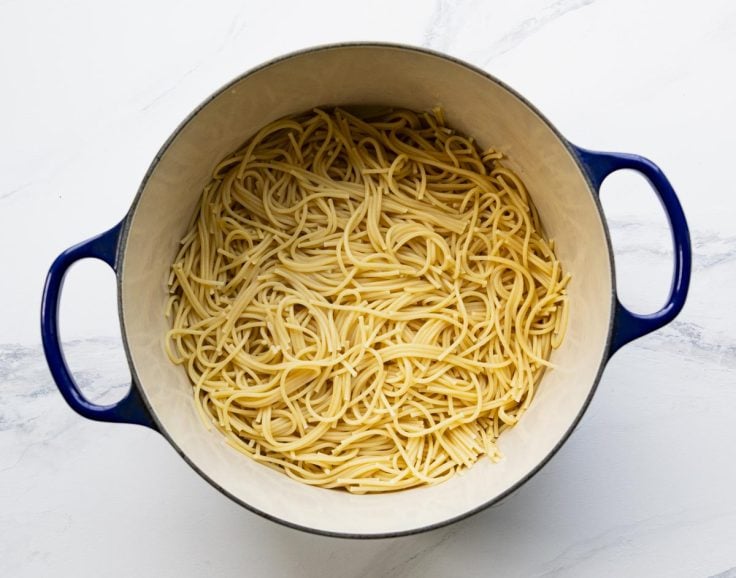 Cooked spaghetti in a Dutch oven.