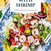 Greek shrimp salad with text title overlay.