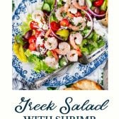 Greek shrimp salad with text title at the bottom.