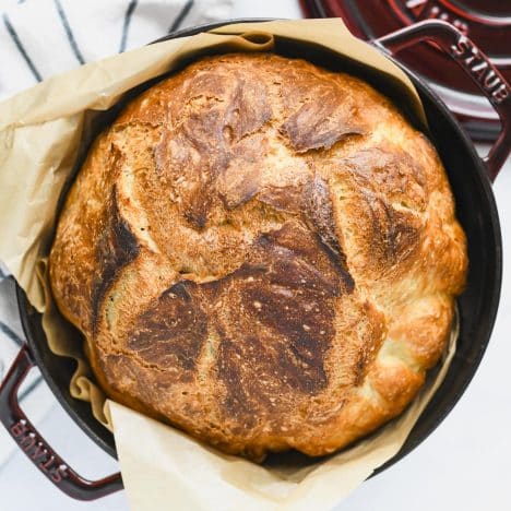 Square overhead shot of a loaf of no-knead Dutch oven bread.