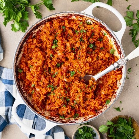 Square overhead image of a pan of the best red rice recipe.